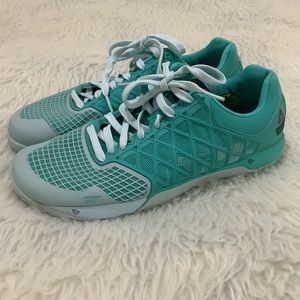 Reebok women’s athletic turquoise cross fit athletic shoes size 9.5
